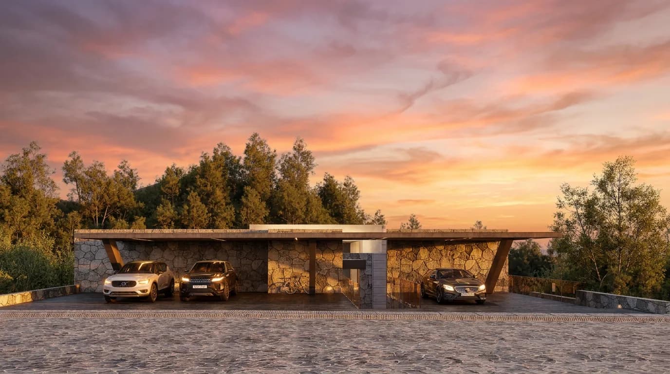 Fachada de la Residencia Santa Bárbara al atardecer, con los autos en el acceso