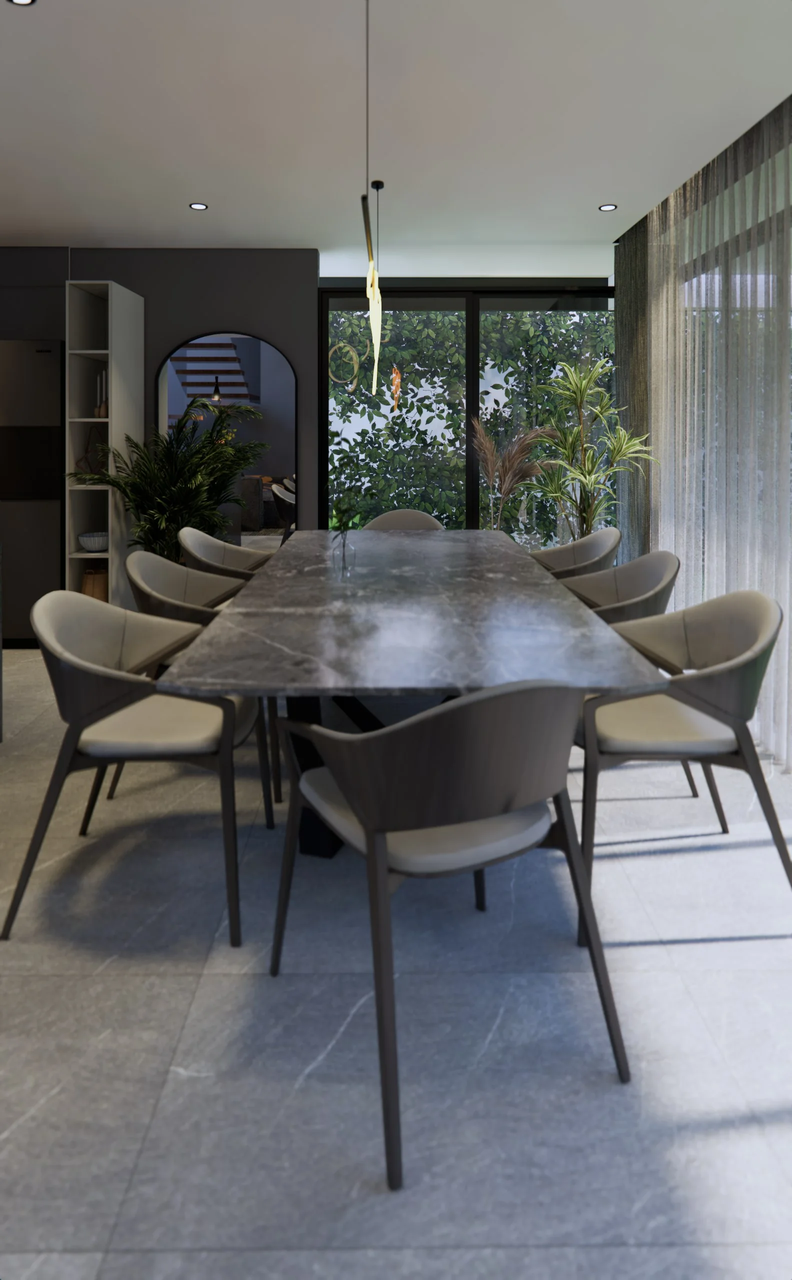 Comedor de Casa Grillos con mesa larga de madera y cortinaje de piso a techo