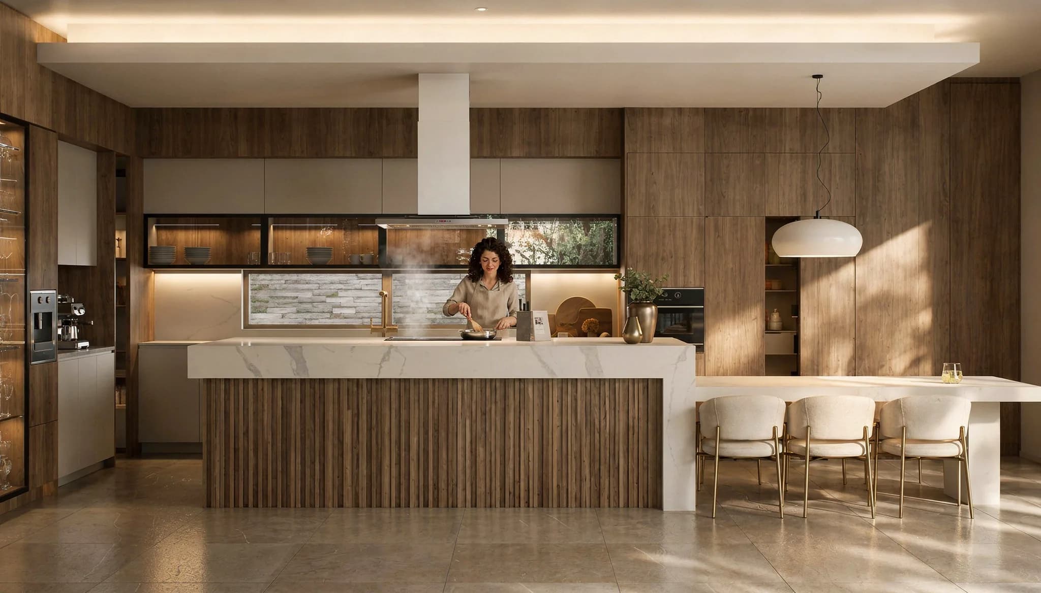Cocina de la Residencia Cardona con isla de mármol y carpintería de madera