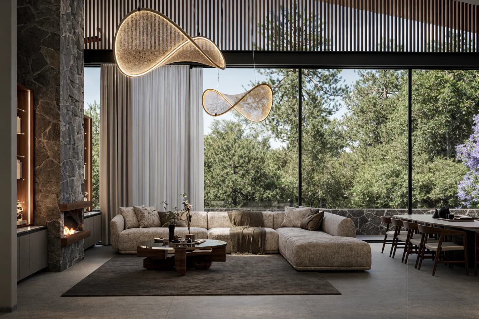 Sala de la Residencia Jade bajo la doble altura, con lámpara escultórica